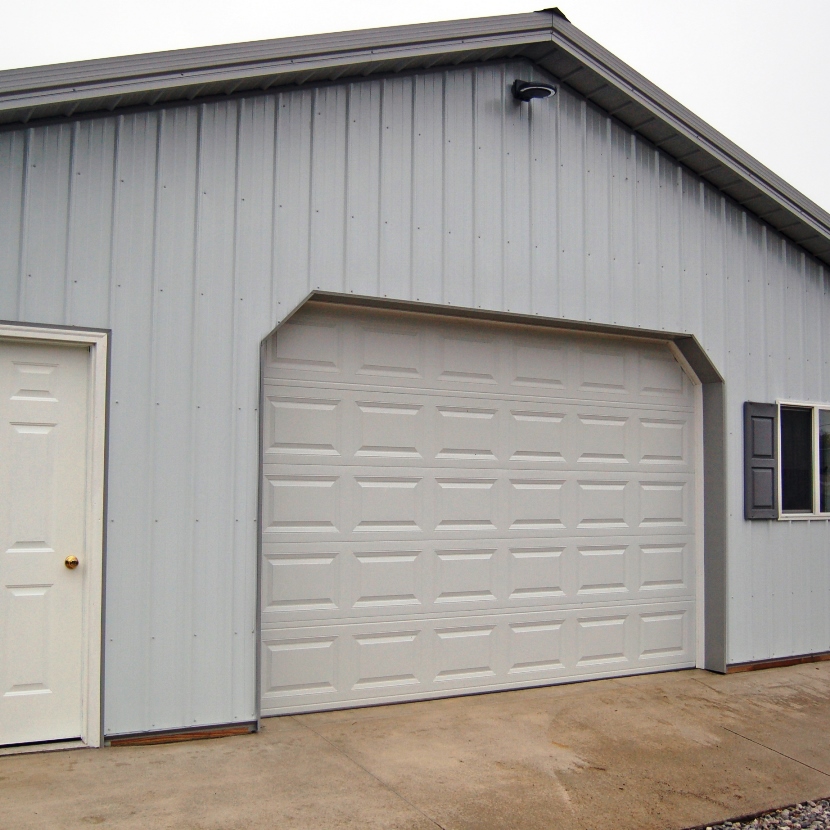 Porte de garage pour installations de stockage